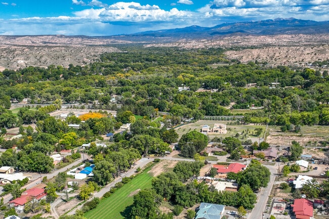 Farms and small ranches are strewn along the Santa Cruz River Espanola.