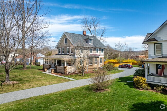 Many of Peapack-Gladstone's homes boast well-tended lawns along lush, tree-lined streets.