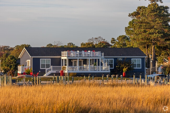 Homeowners make unique additions to homes in Long Neck like this roof top deck.