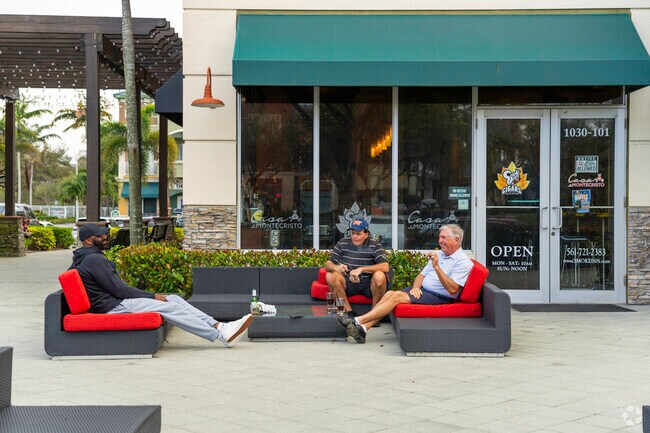 Share quality time with friends at Smoke-In Cigar shop near Dos Lagos.