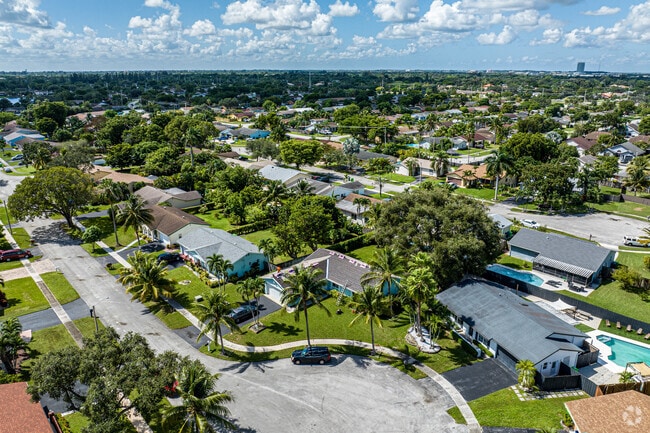 Woodstock residents enjoy the warm weather and palm tree lined streets of their neighborhood.