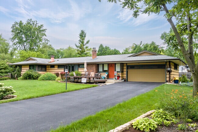 At Northside-Wheaton, ranch-stye home with a bright red entrance door.