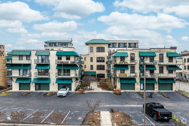 There are several condo complexes near the Grand River in Grand Haven.