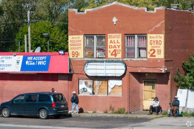 Ford Heights locals like to hang out near Lincoln Highway and Woodlawn Ave enjoying the sun.