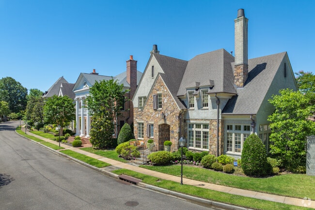 Larger French country-style homes are typical in Poplar Pines' gated communities.