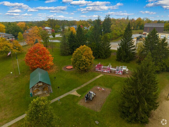 Chi-Bro Park has a public safety themed playground close to downtown Manchester.