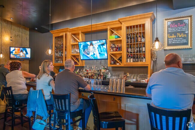 91-Oven near Washington Square features a woodfired oven.