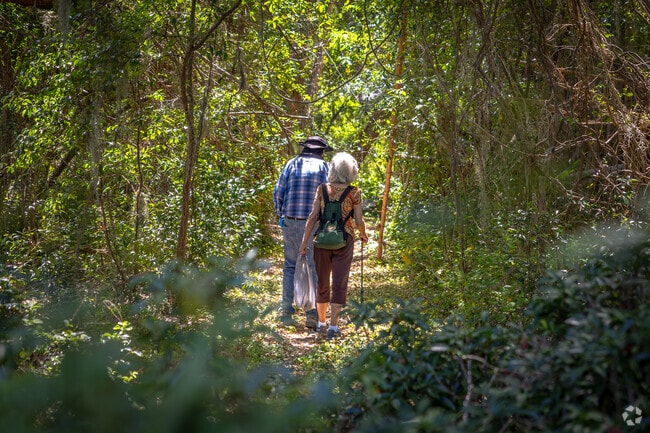 Traverse scenic wooded trails at Lake Region Audubon Nature Preserve.