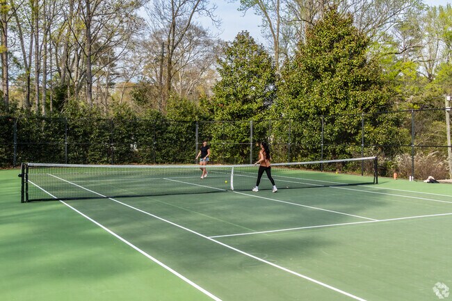 Residents can enjoy the tennis courts at Overton Park.