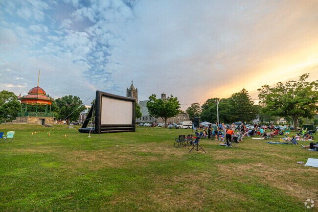 Residents gather for The Movies By The Lake, a weekly gathering in the summer in Wakefield, MA.