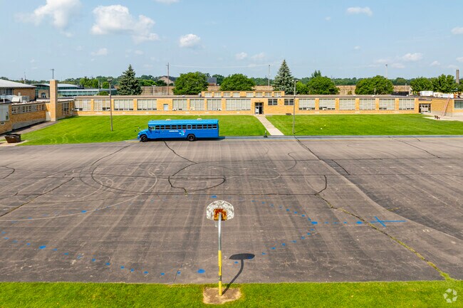 A large play area for students can be found behind St John Elementary Catholic School.