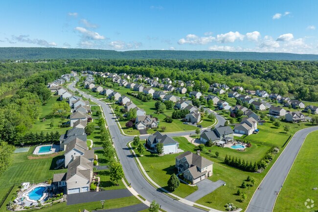 New developments in Silver Spring Township often border wooded open space.
