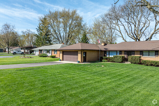 Quiet, tree lined streets with well maintained yards are found throughout Green Acres.