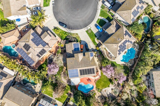 Tiled roofs and backyard pools are common at Bridgeway Lakes in Southport.