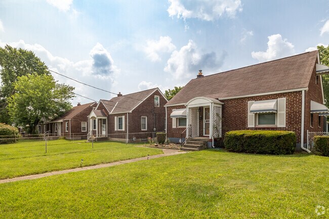 These charming brick homes span the eastern edge of Devon Triangle.