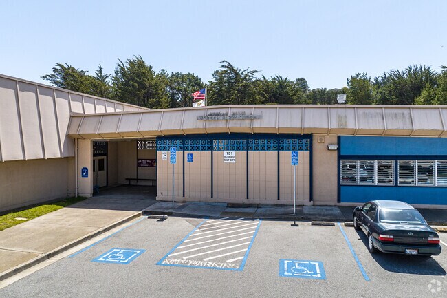 Junipero Serra Elementary School keeps a low profile in the neighborhood.