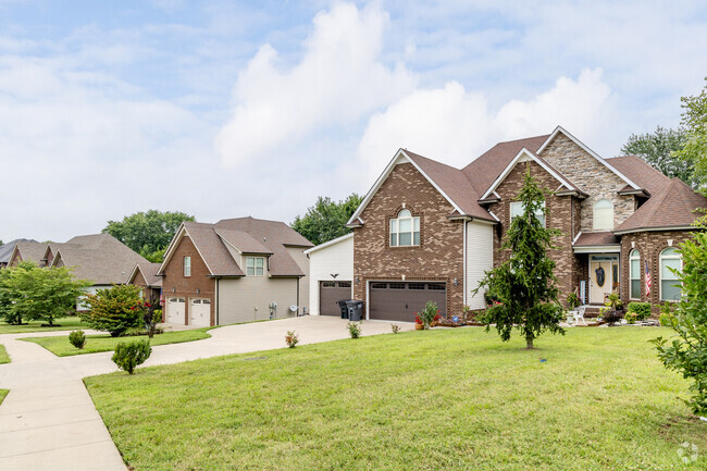 Rows of homes with green grassy lots can be found in Ellington Chase.