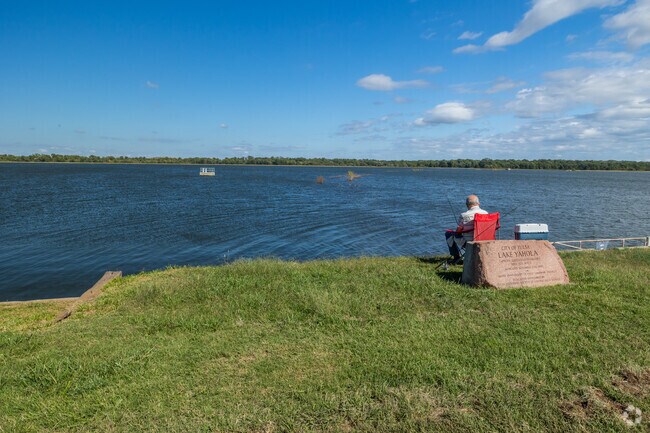 Scenic Yahola Lake is perfect for a family picnic or a day of fishing in North Ridge.