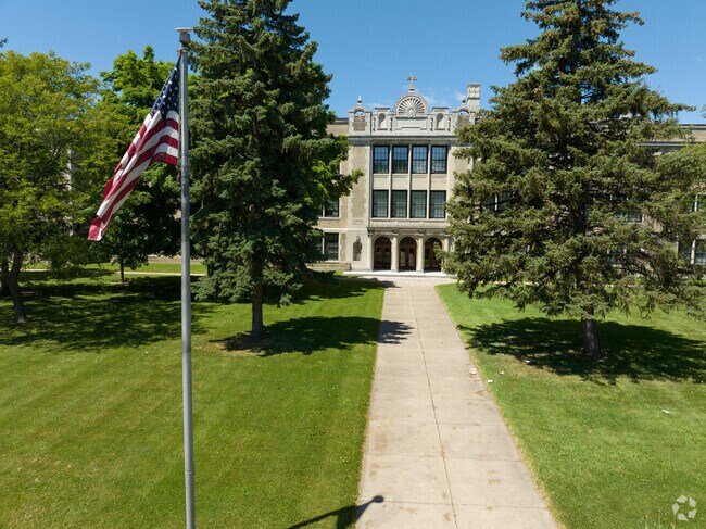 Aquinas Institute features an expansive two-story library for students.