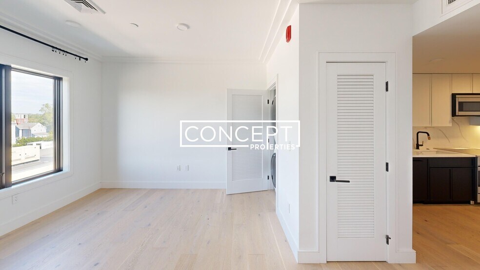 50 Leo M Birmingham Pkwy unit 405, Boston, MA 02135 - photo 1