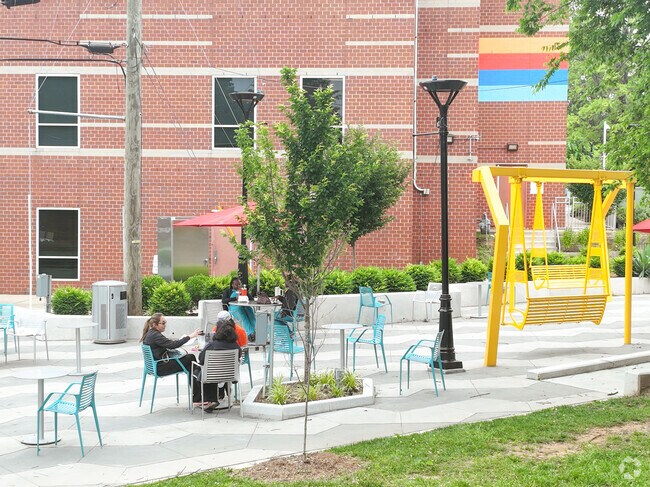 Residents of University Park enjoy conversation on a nice sunny day.