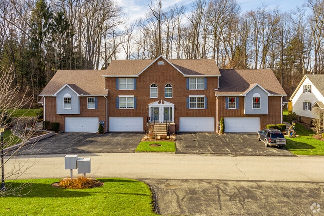Parts of Delmont include beautiful condos tucked among the trees.