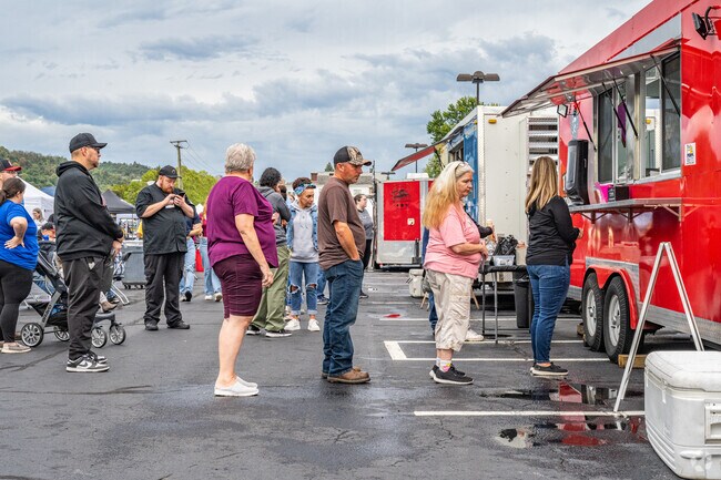Lines formed at the food trucks as visitors placed their orders at the Eats and Beats Festival.