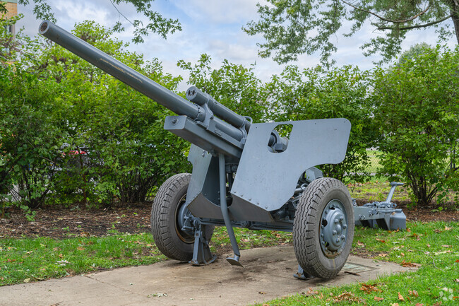 An artillery cannon sits in Market Square Memorial Park south of Trainer, honoring veterans.