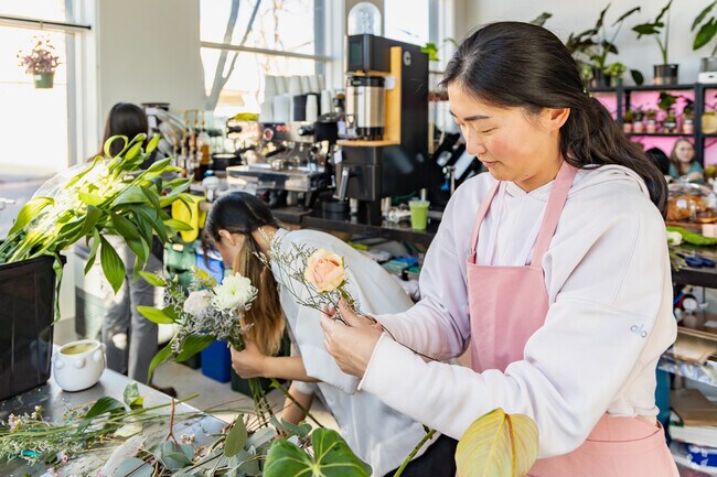 Grab your next coffee from Bloomsgiving where you can find fresh flower bouquets and plants.