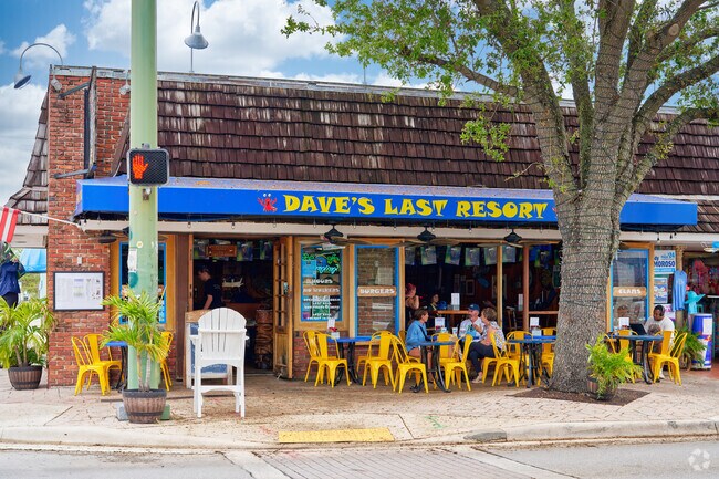 Locals enjoy street side eats at Dave's Last Resort in downtown Lake Worth by Mango Groves.