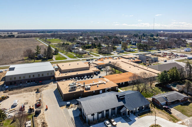 Hemlock High School Early Middle College is in the north side of Hemlock.