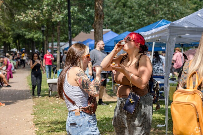 People taste the many pie samples during the Porches and Pies Fest at Adair Park.