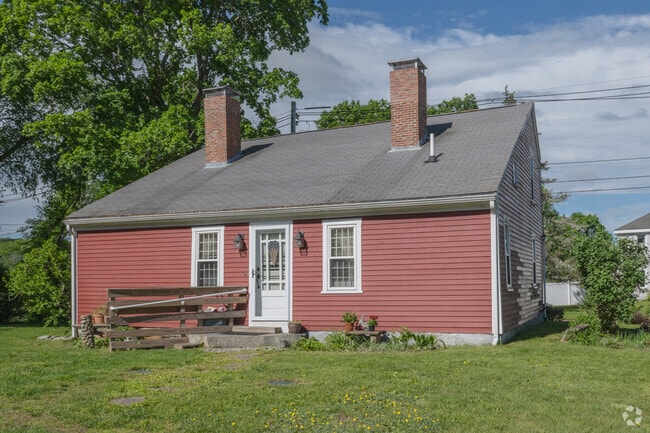 An elegant antique Cape Cod style home in Dighton delights all who pass by.