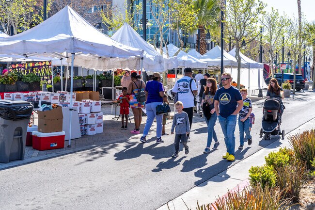 Families exploring The BLVD Market in Central Lancaster.