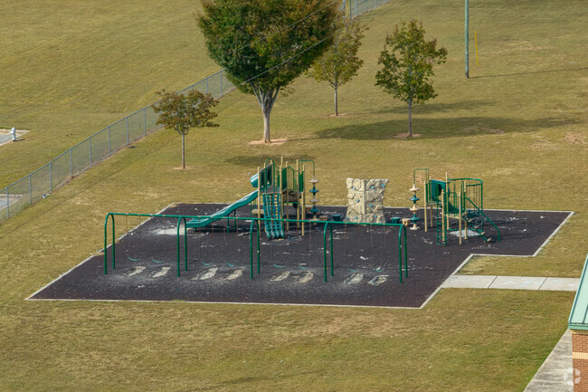 Thurgood Marshall Elementary School feautures a playground in the yard.
