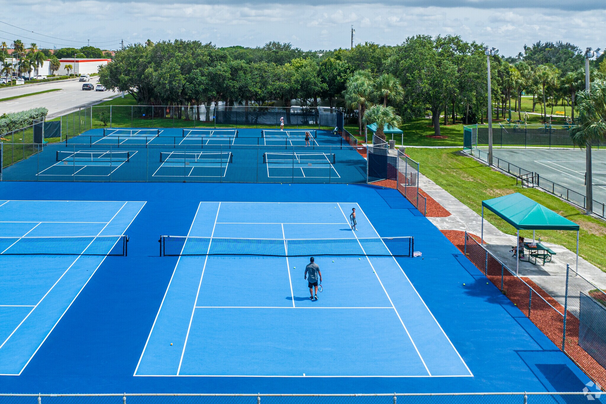 Tennis and social bonding are unique perspectives on Quail Ridge and community life.
