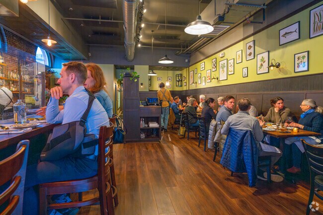 Enjoy dinner and drinks with some company at Thistle & Leek in Newton Center.