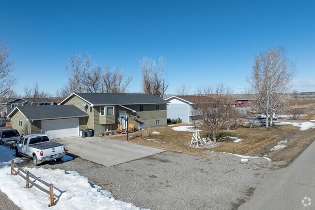 A row of national-style homes in Worden showcases early American architectural influence.