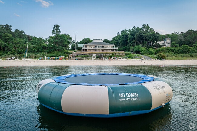 Jump, play, swim at your own private beach in Shoreham.