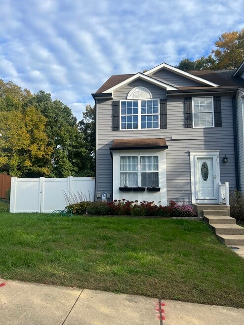 Front view end unit town house side and rear yard