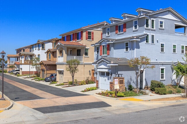 Attractive new builds grace the Signal Hill neighborhood.