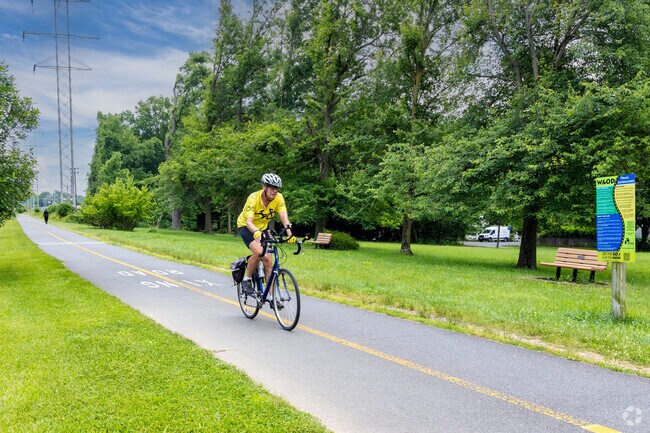 Enjoy a scenic bike ride on the W&OD trail in Dunn Loring neighborhood.