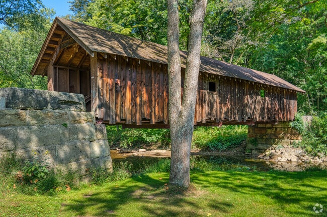 Brush Creek Park in Marion Township has a covered bridge that leads to walking trails.