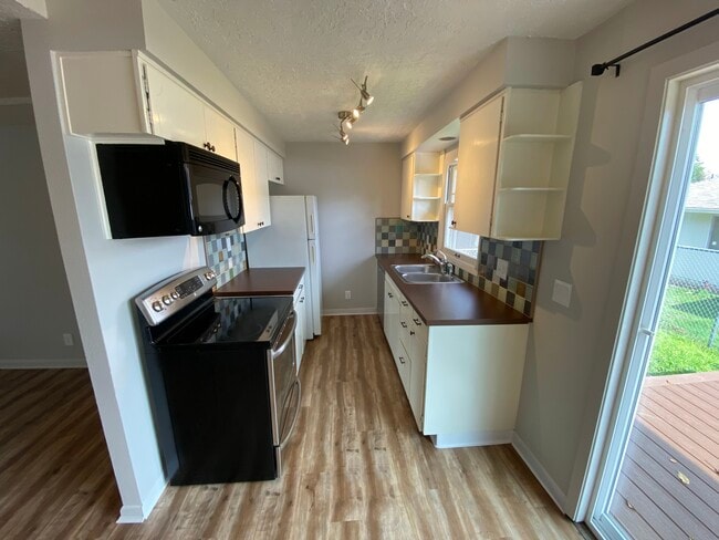 Kitchen with SS appliances