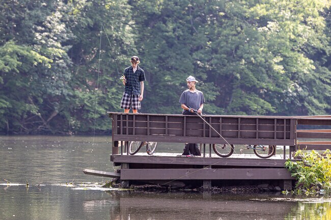 The pond at Center Springs Park draws fishermen from across Manchester.