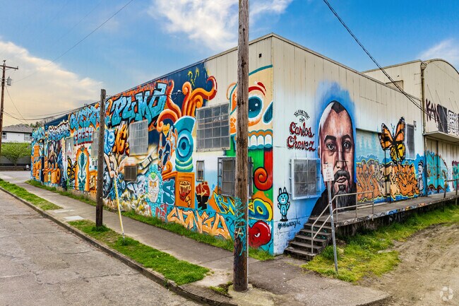 Lively Mural wraps an industrial building besides the St. John's bridge.
