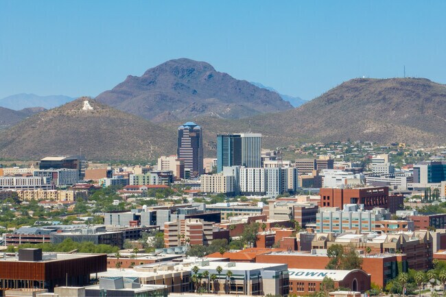 Blenman-Elm is set against the backdrop of Downtown Tucson and Sentinel Peak.