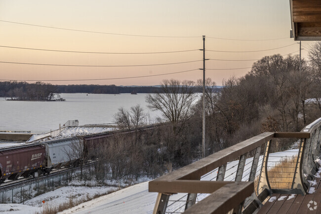 Onalaska's Great River Landing lookout offers scenic views of a railroad with Lake Onalaska as its backdrop.