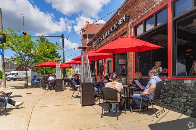During a beautiful day out, locals enjoy having lunch outside in Walpole's downtown area.