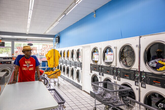 Wash clothes at the local laundromat in Marian Cold Springs.